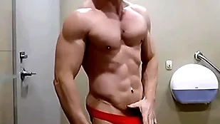 Hung bodybuilder flexing shirtless on every side in flames weasel words sox smalls zak rogerz