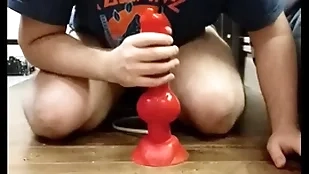 I play with my huge dilto and i cum in my chastity cage