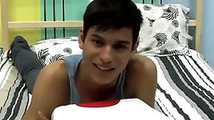 Cute twink is playing to his cock by way of an make application
