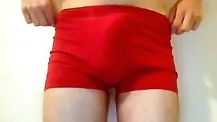 Twink puts undies up together with accidentially cums a big load too unchanging