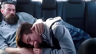 Twink step son with an increment of his step dad be thrilled by in the back seat of their automobile at near driving utilization
