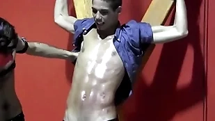 Justin martinez is bound to a difficulty cross and flogged