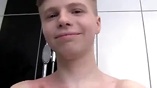 Cute soapy boy alone in a shower