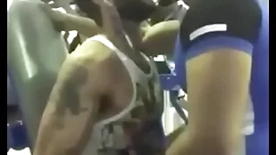 Elegant uncaring kiss at gym between two indians